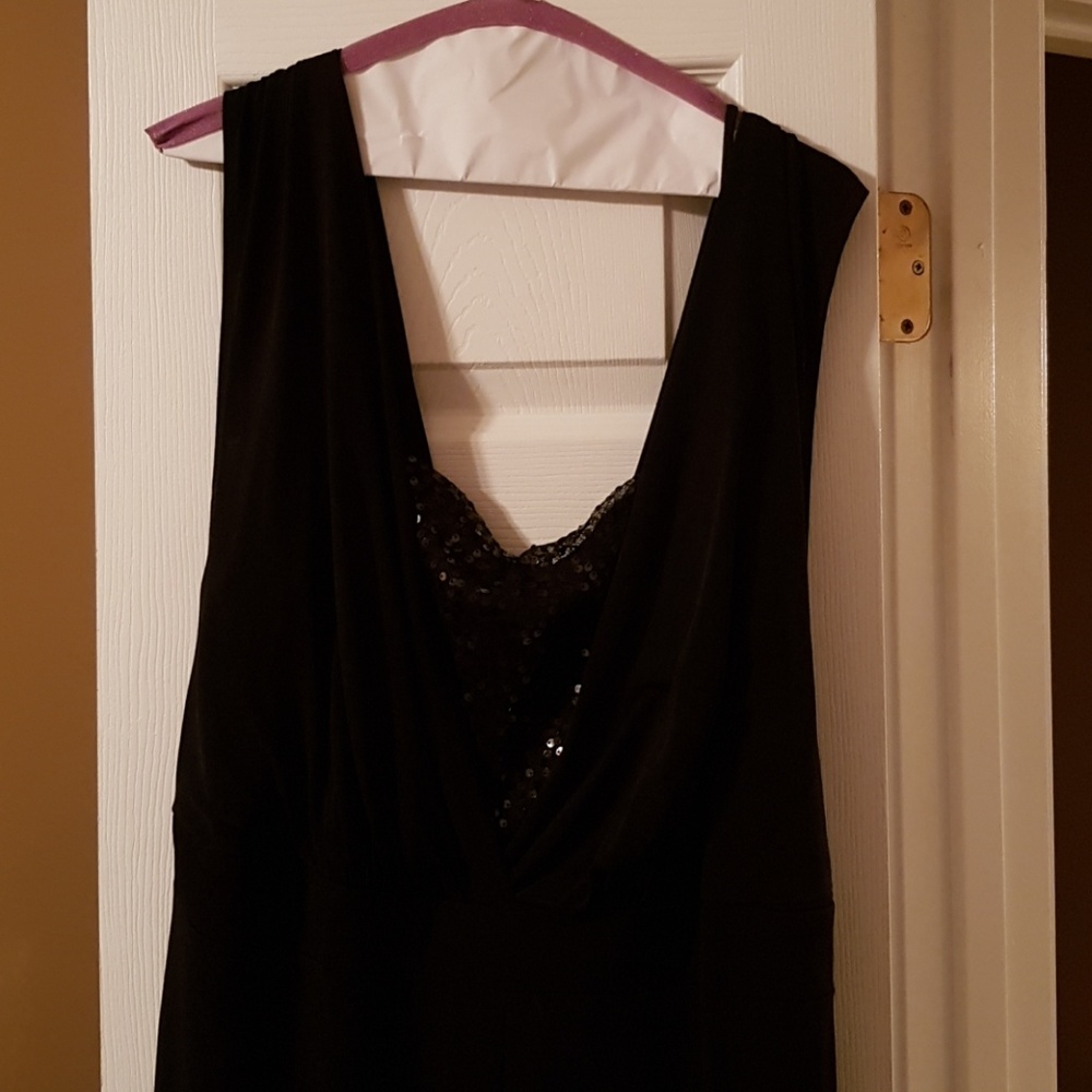 Black jumpsuit with sequined bodice.